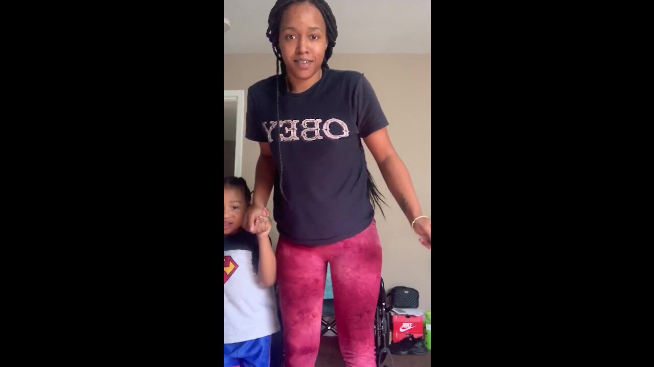 4-year-old son helps mom take her first steps