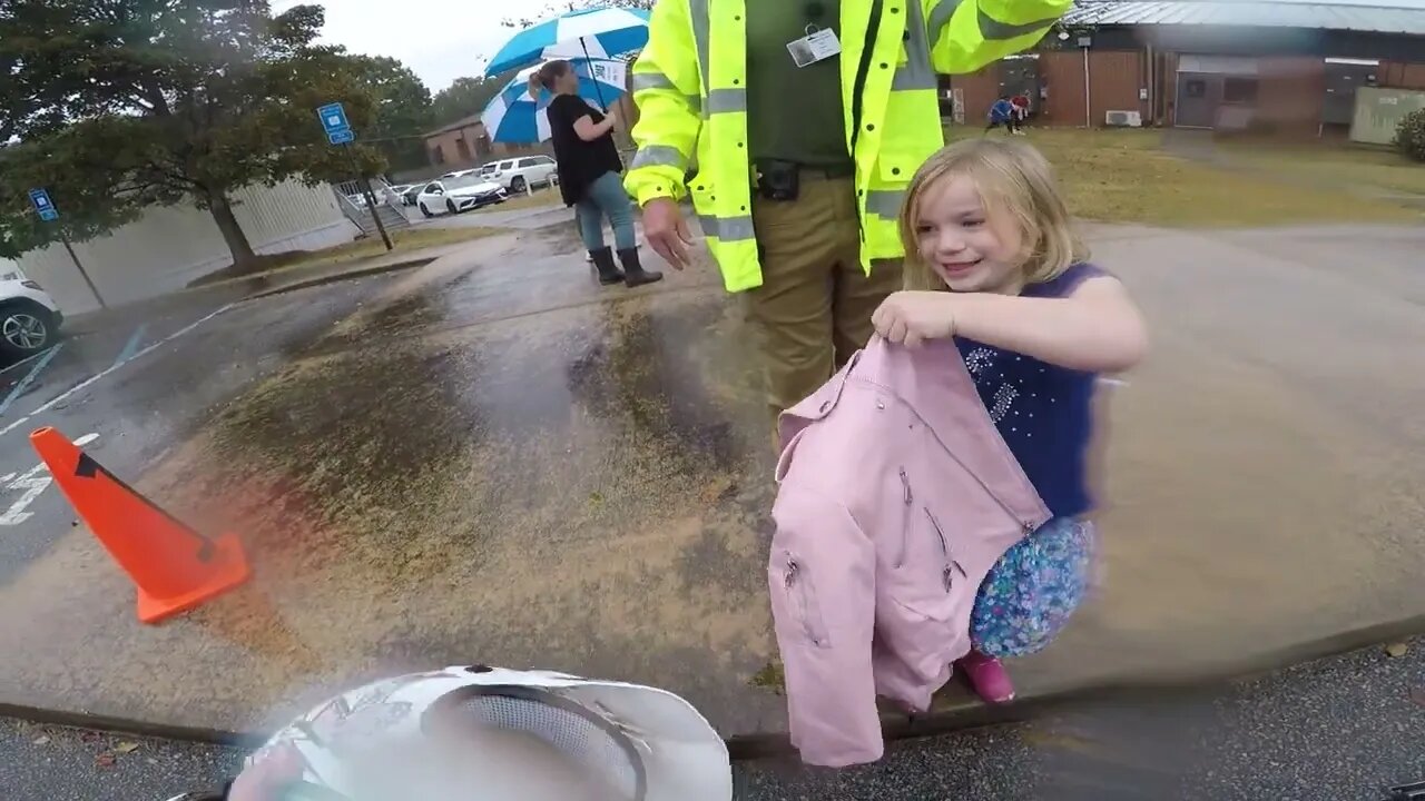 School Pickup in the Rain