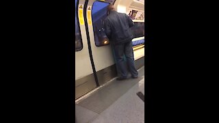 Dude loves to sing while on the train