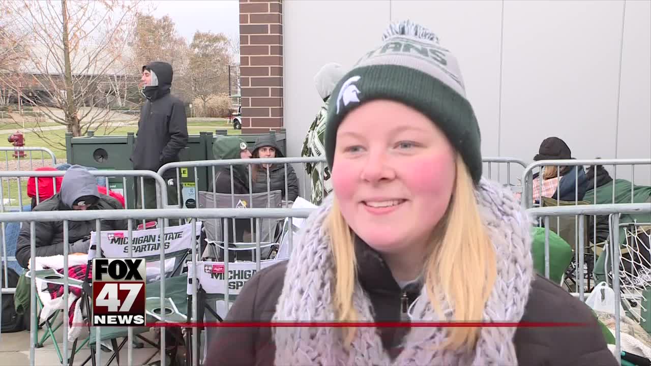 Fans wait outside of Breslin Center