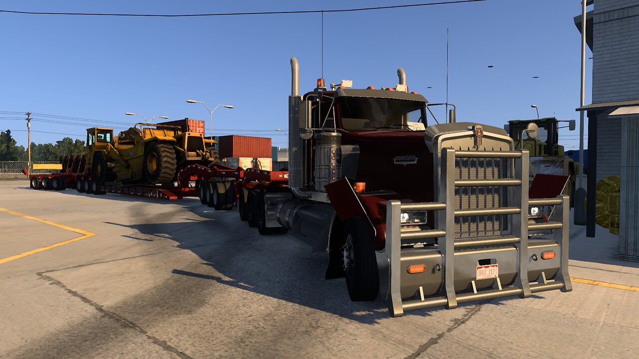 American Truck - Hauling a 40T big scraper machine cargo