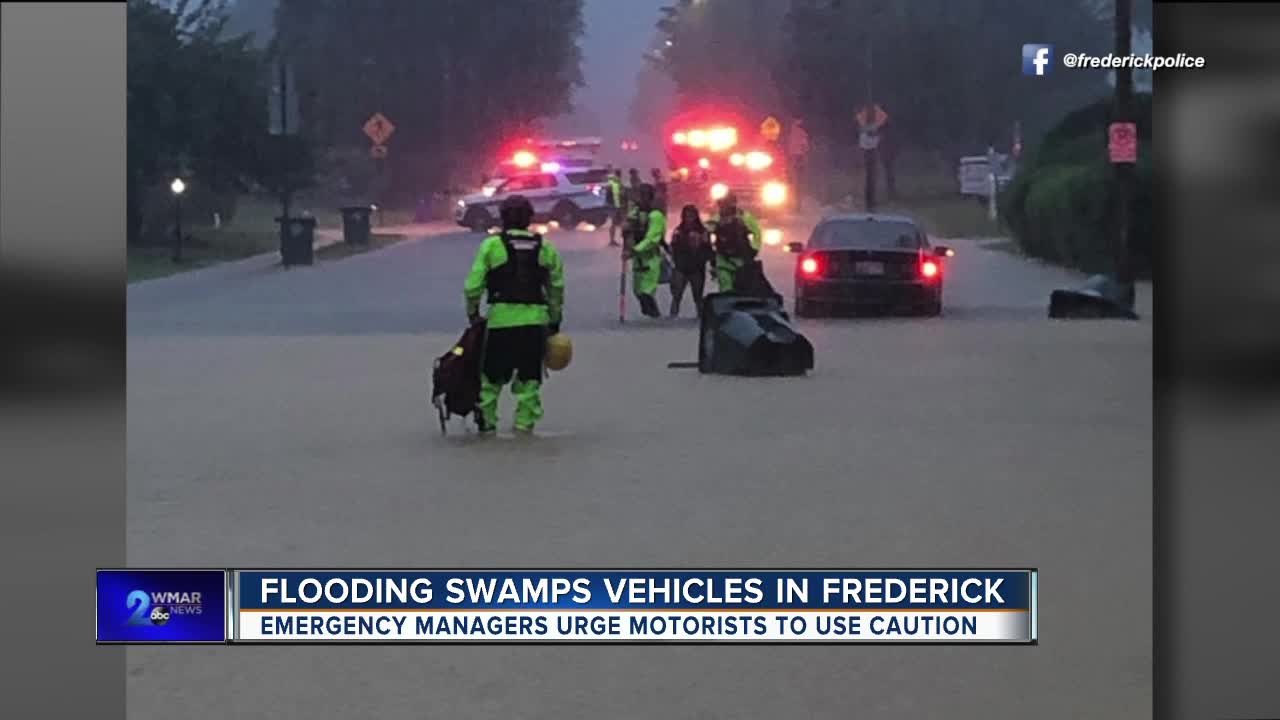 Flooding swamps vehicles in Frederick