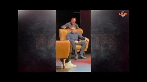 GSP sneaks up on Khabib and does a rear naked choke