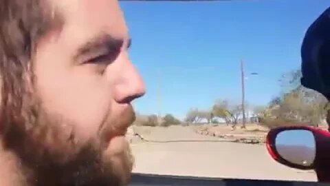 Mick and Mom Driving on a Dirt Road in My Car