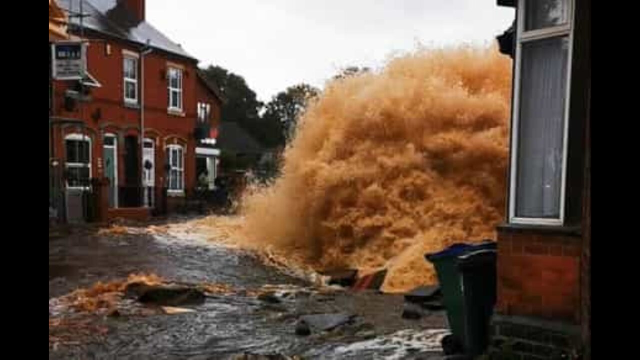 Pipes burst and flood street in the UK