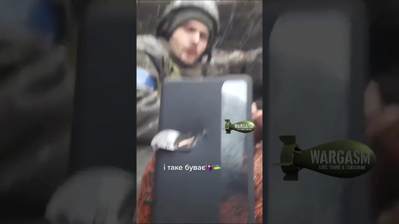 ARCHIVE: Ukrainian soldier's cellphone catches a bullet