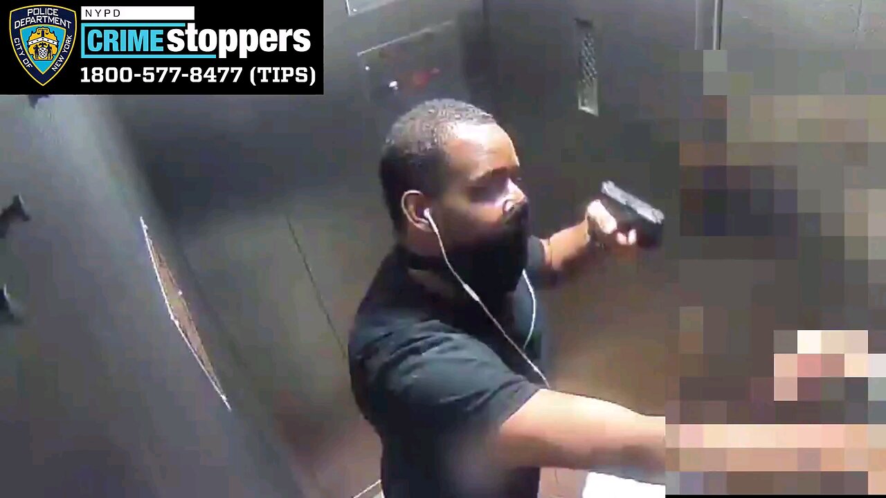 Man robs innocent woman in elevator.