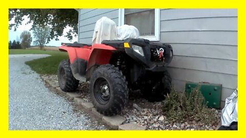 Putting a cover on a ATV