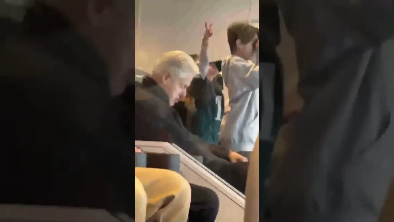 "Somebody shake him!" Bill Clinton appears to fall asleep at football game