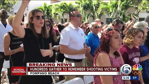 Hundreds gather to remember shooting victims