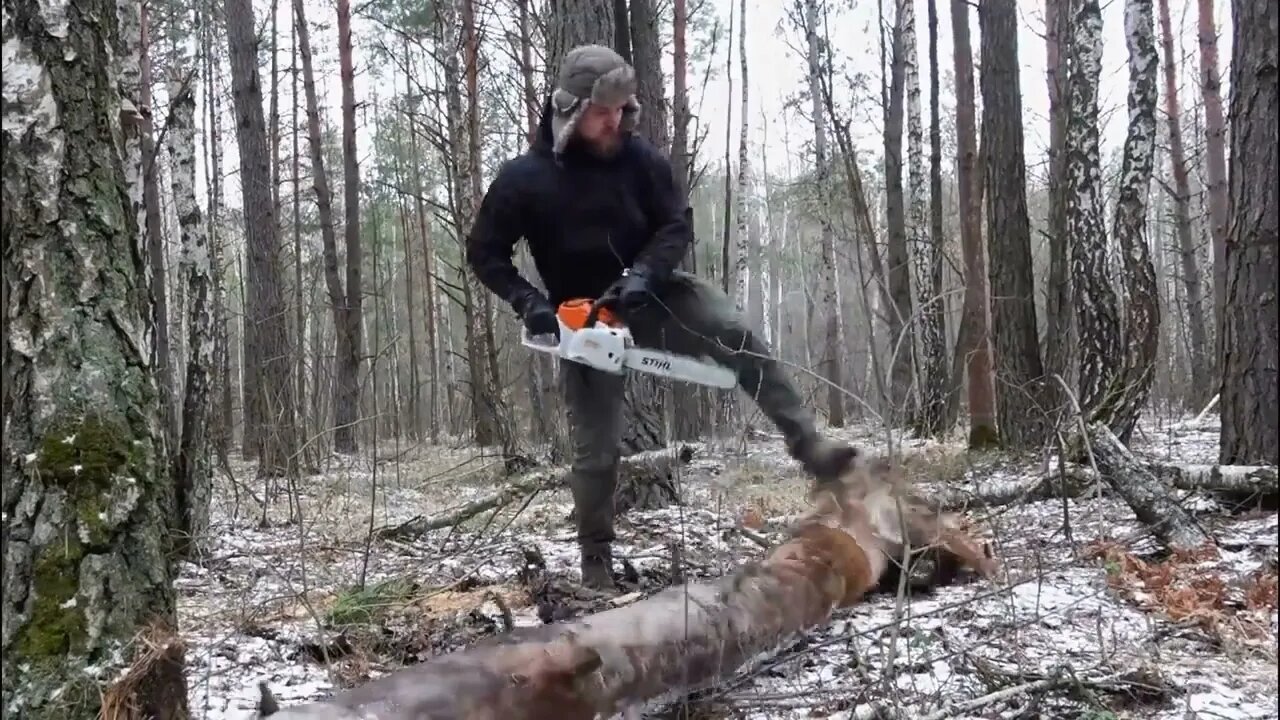 hiding in a huge dugout during a snow storm, spending the night in bushcraft shelter * 11