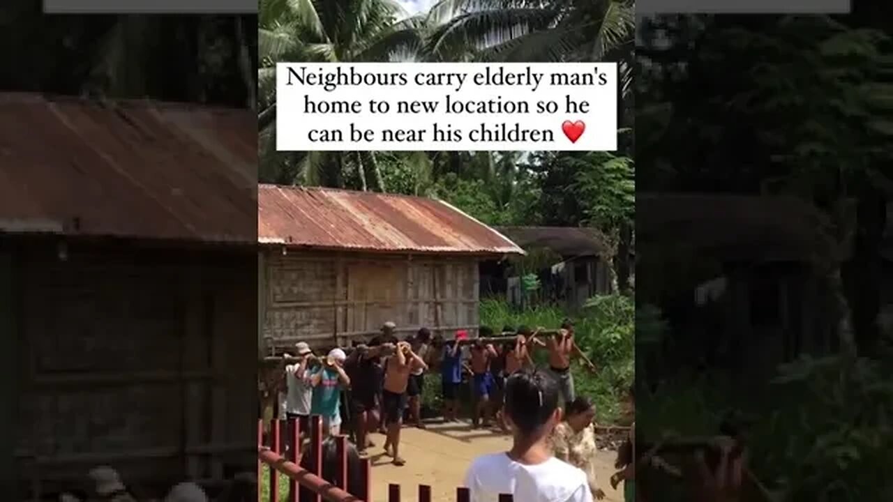 Philippine villagers carry an elderly guy's home