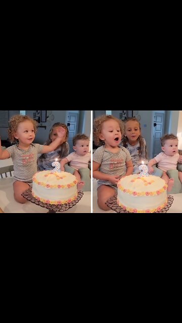 Toddler Tries To Blow Out Birthday Candle After Dad Blocks It Twice