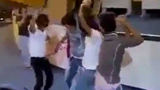 Iranian students dancing in classroom