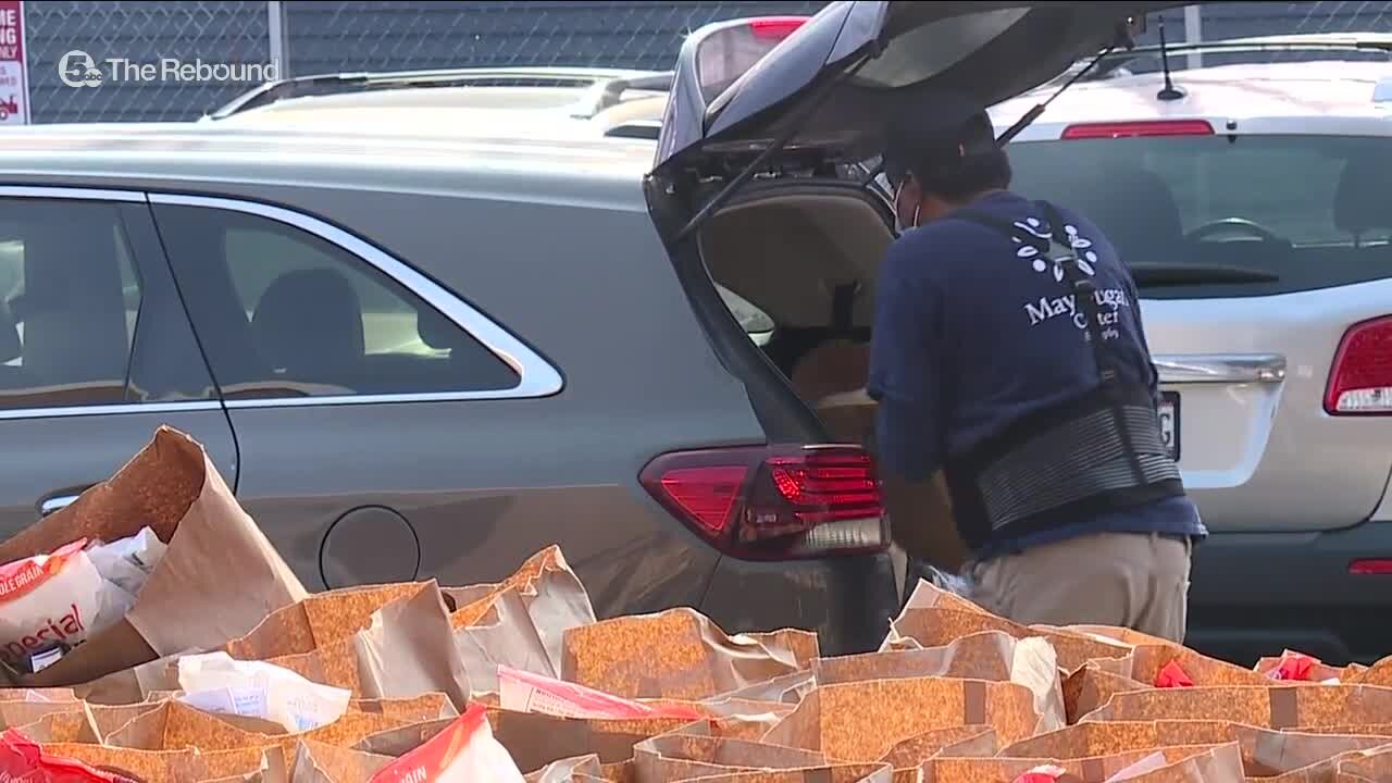 One year since the stay-at-home order took effect, May Dugan Center marks 500,000 meals served to the community