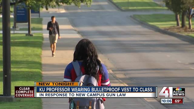 KU professor wears bullet proof vest as students now allowed to carry guns on campus