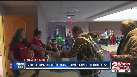 250 backpacks with hats, gloves given to homeless