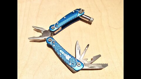 $5 X-Gear light blue multi-function sprocket series pocket tool with LED light