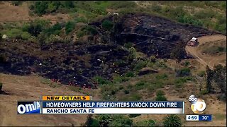 Homeowners help firefighters knock down fire