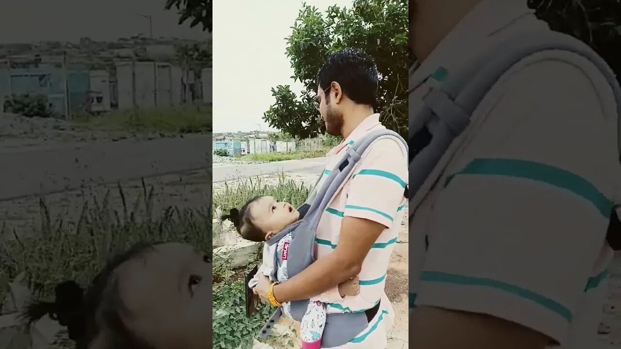 baby and papa walking