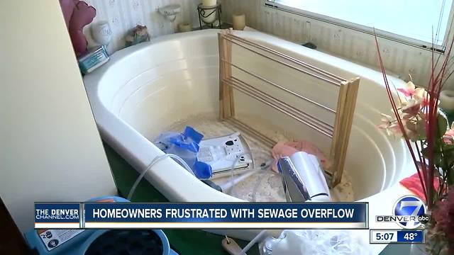Sewage blowout damages homes