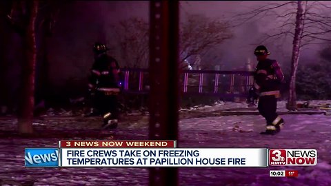 Multiple fire departments battle house fire in Papillion