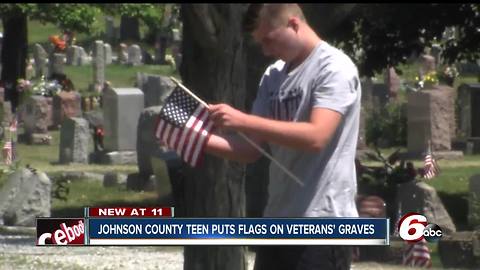 Johnson County teen puts flags on veterans graves