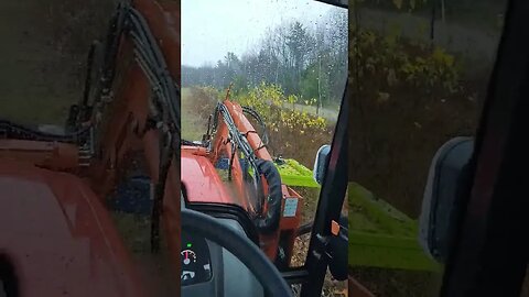 Lane shark with a 2 foot extension on my Koiti tractor trimming the runway.