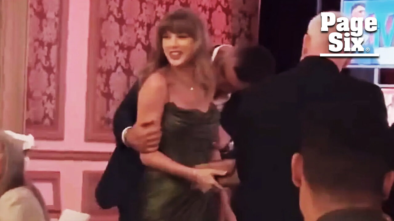 Travis Kelce can't keep his hands off Taylor Swift in sweet shoulder-kiss video from gala date night