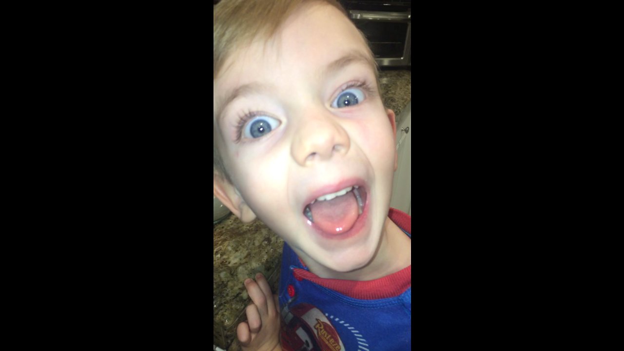 Boy super excited about his Mickey Mouse pancake