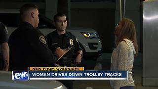 Woman drives drunk on trolley tracks