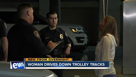 Woman drives drunk on trolley tracks