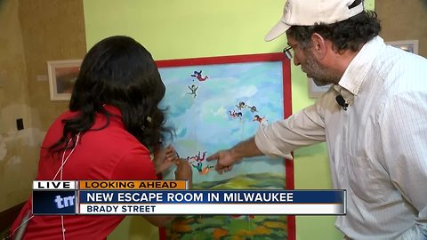 Lauren Winfrey tries to escape the new Escape Room on Brady Street