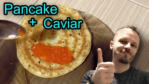 We eat Russian pancakes with caviar