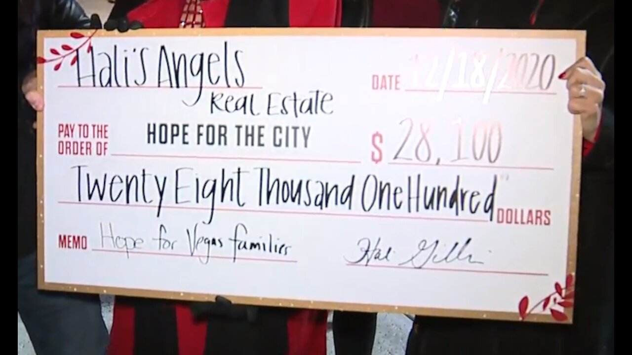 Hali's Angels Real Estate makes donation to Hope For The City