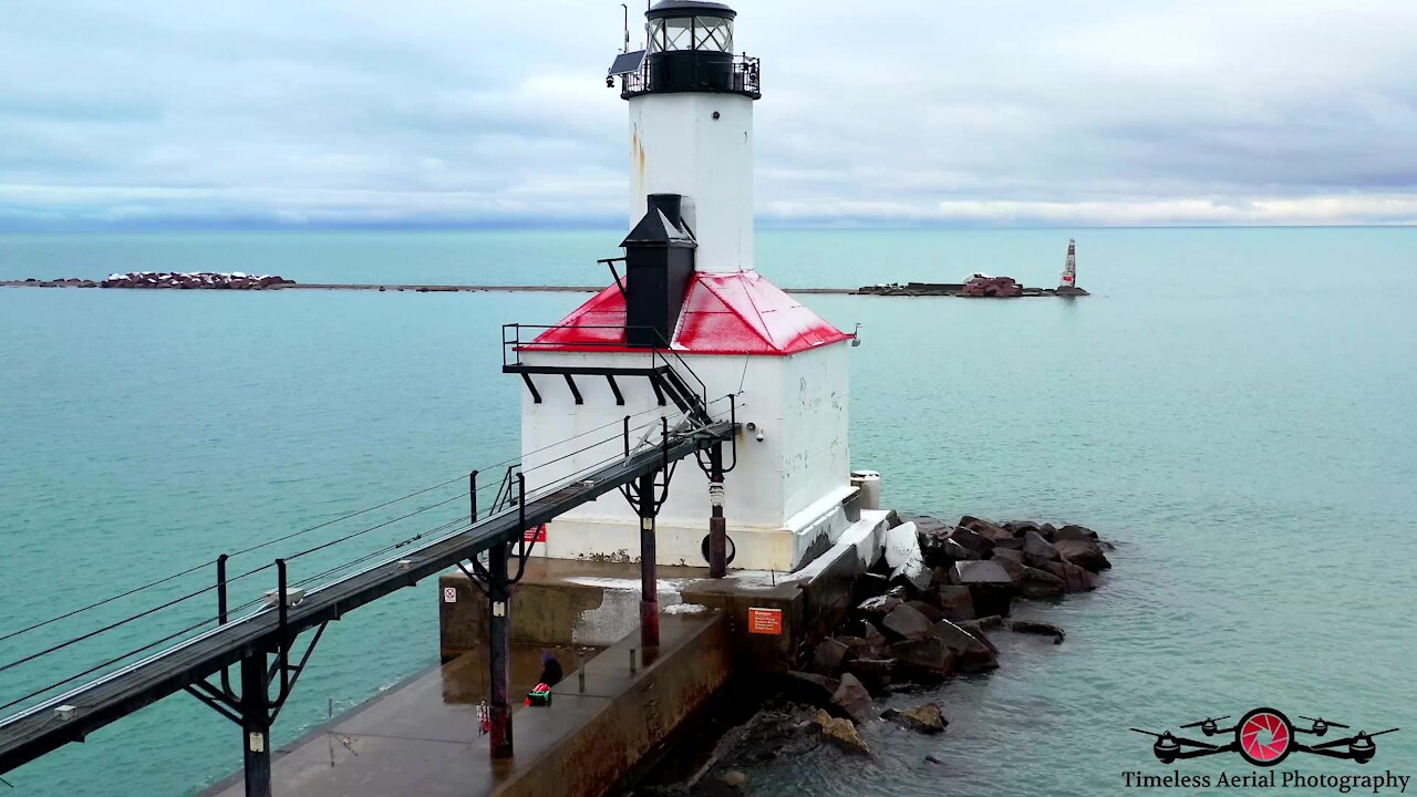 Lake Michigan lighthouse winter tour drone footage