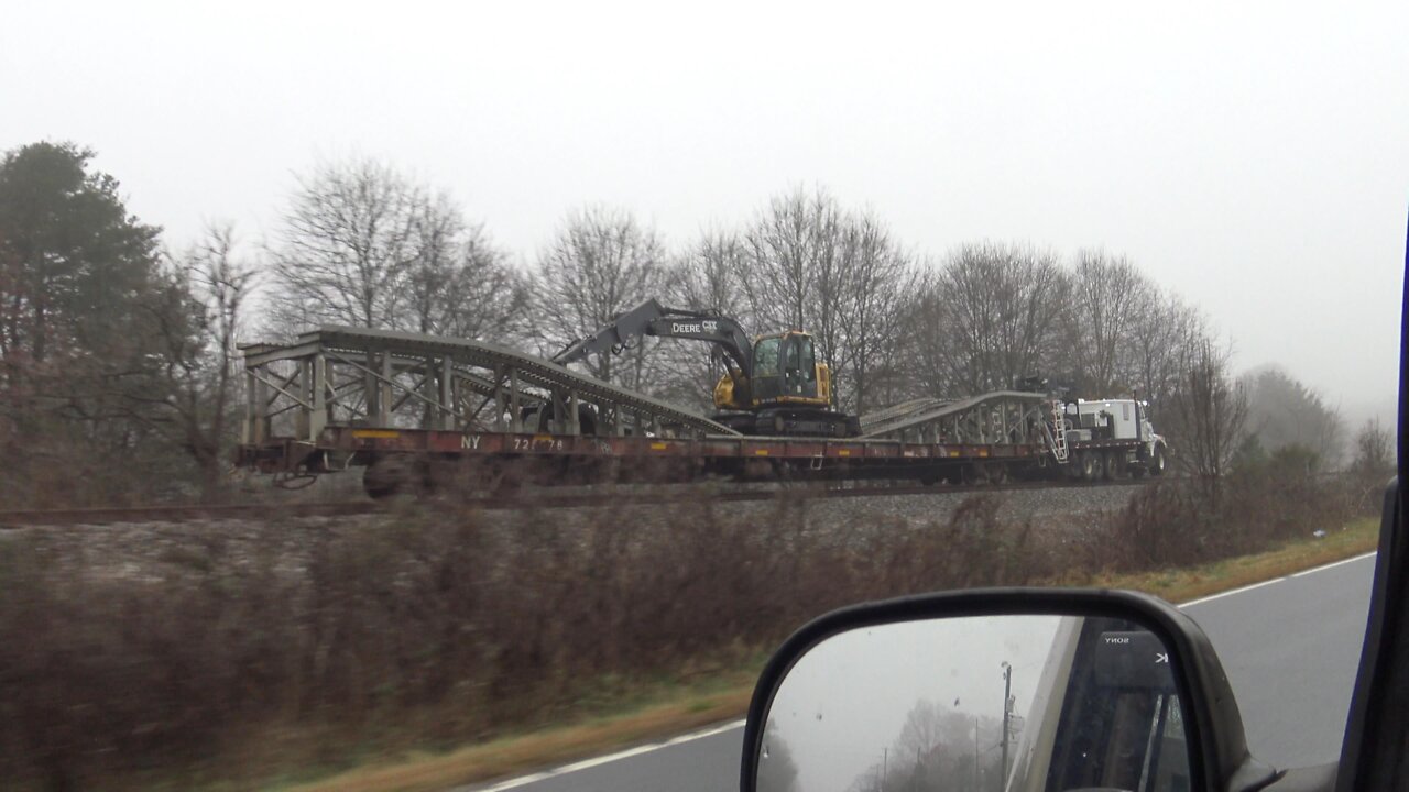 Driving Beside A CSX Truck Pulling A Flatcar And Excavator 2-3-22