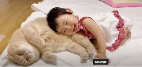 Sweet baby and her Cat