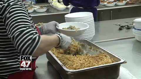 Volunteers make Christmas dinner at local church