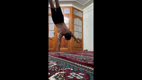 One arm handstand