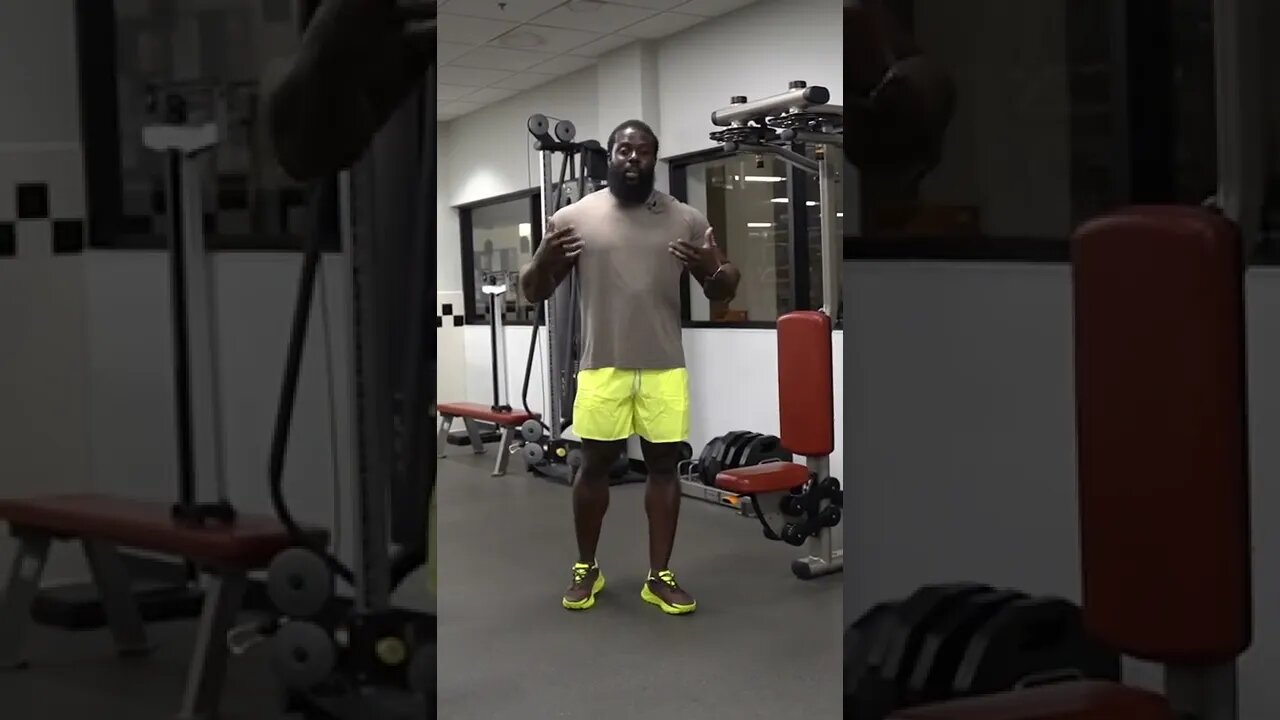 Shredded Black dude works out Shoulders. lol