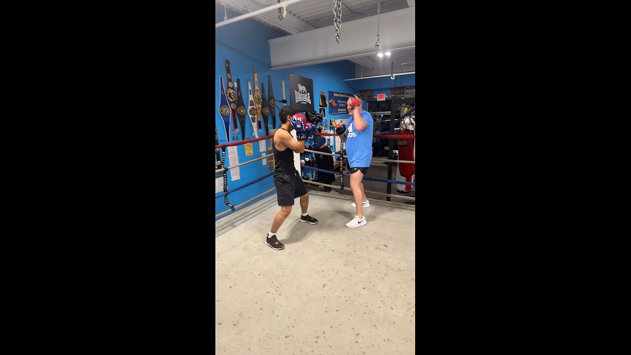Julian on mitts with Shawn