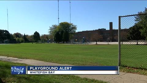 Man approaches children on Whitefish Bay playground