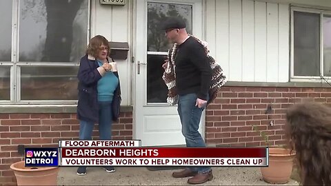 Volunteers rush to offer help to local flood victims in Dearborn Heights