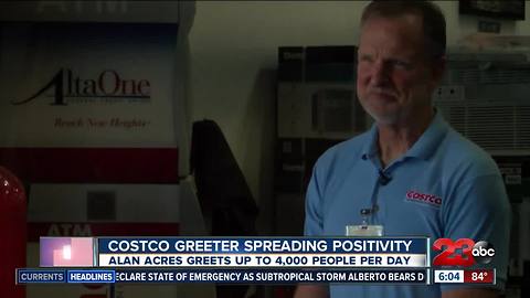 Costco greeter spreading positivity with a smile, song, and cheer