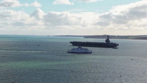 USS Gerald R Ford departing Stokes Bay Portsmouth UK American Aircraft carrier drone footage