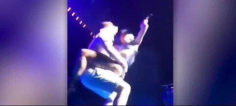 Lady Gaga and fan fall off stage