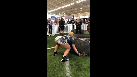 Strongwomen attempts to lift 500lb tire