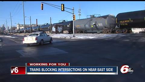 Indy residents upset over trains stopped on tracks, blocking roads