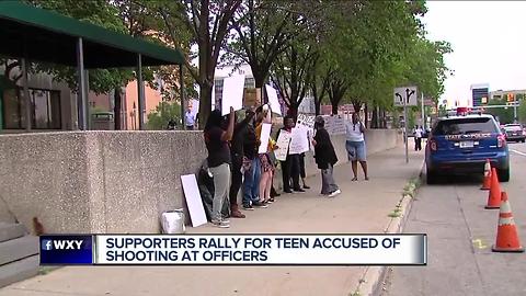 Supporters rally for teen accused of shooting at officers